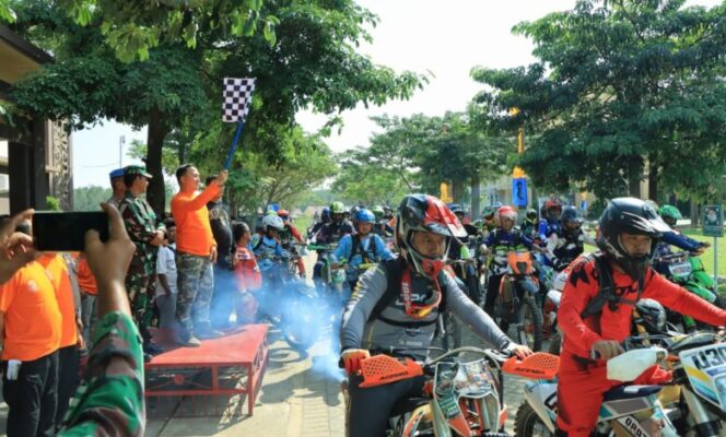
 Kapolres Tulang Bawang Barat, Melakukan Pelepasan Gas amal, Trail Adventure dalam Rangka HUT Bhayangkara ke -79